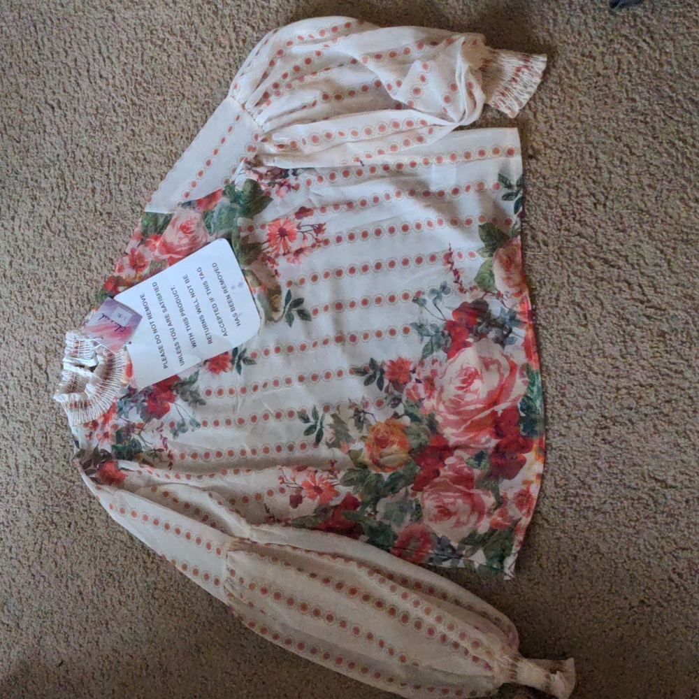 A dressy shirt/blouse. OG price $60 selling for $35.25